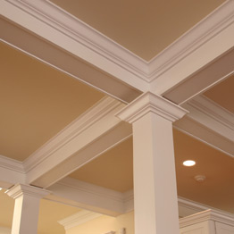 Image of a ceiling with posts and trim.