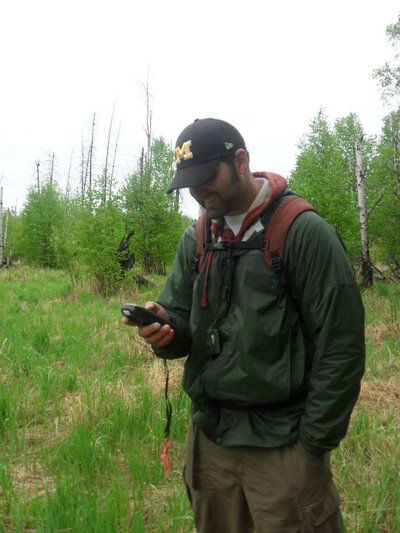 Erik Boren collecting data in the field.