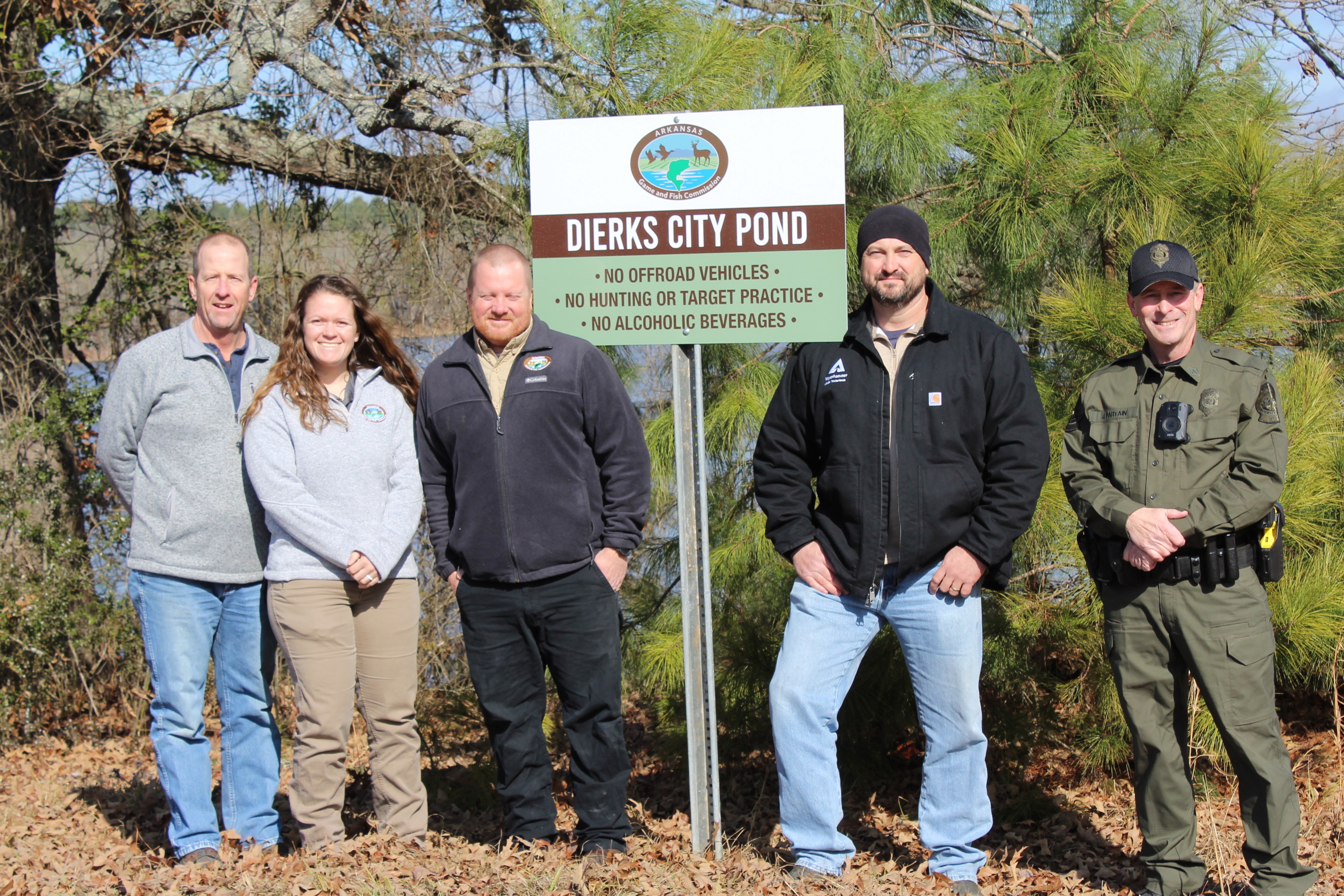 Image of Weyerhaeuser representatives and state and local officials who toured the Dierks City Pond site.