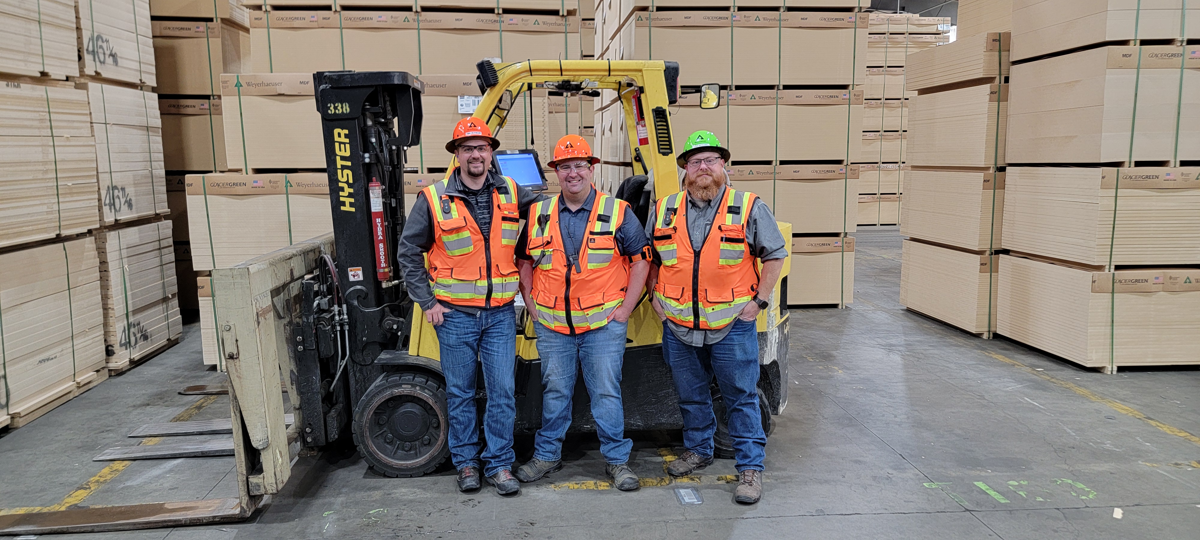 Image of Travis Fields, operations manager; Jordan LeFever, lumber safety liason; and Mike Butzlaff, shipping supervisor at the Columbia Falls MDF Mill.