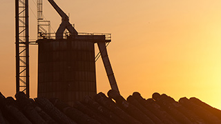 Backlit facility shown at dusk