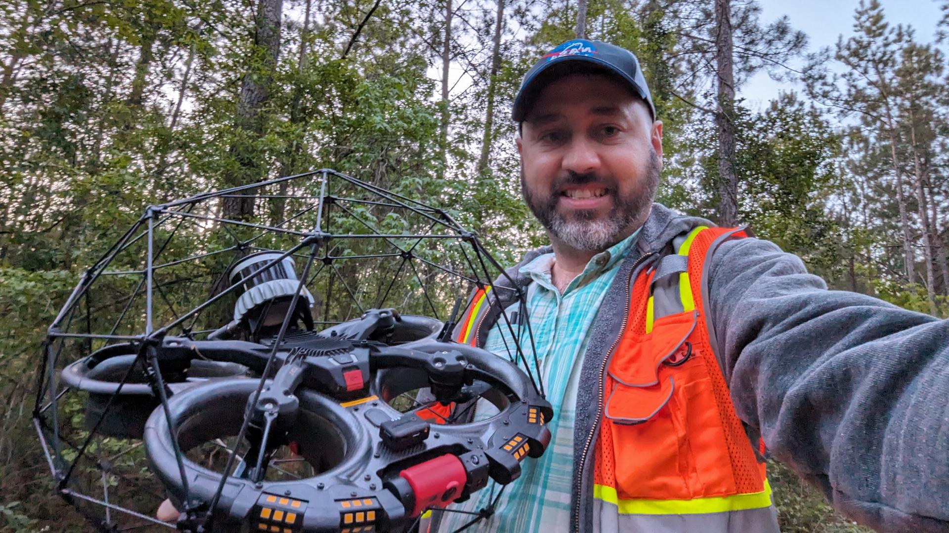Image of James Liston with the Elios 3 drone outside near Arcadia, Louisiana.