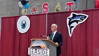 Image of Seaside School District Superintendent Emeritus Doug Dougherty at the grand opening of the Seaside School DIstrict's new campus.