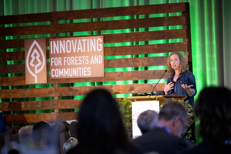 Image of Laura Six speaking at the SFI conference last year.
