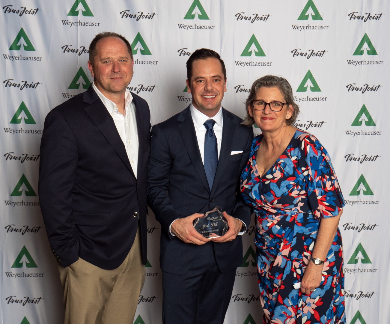 Image of Josh, center, with Neal Shunk, VP of Sales and Marketing and Supply Chain, and Wendy MInichiello, Sales Director - EWP.