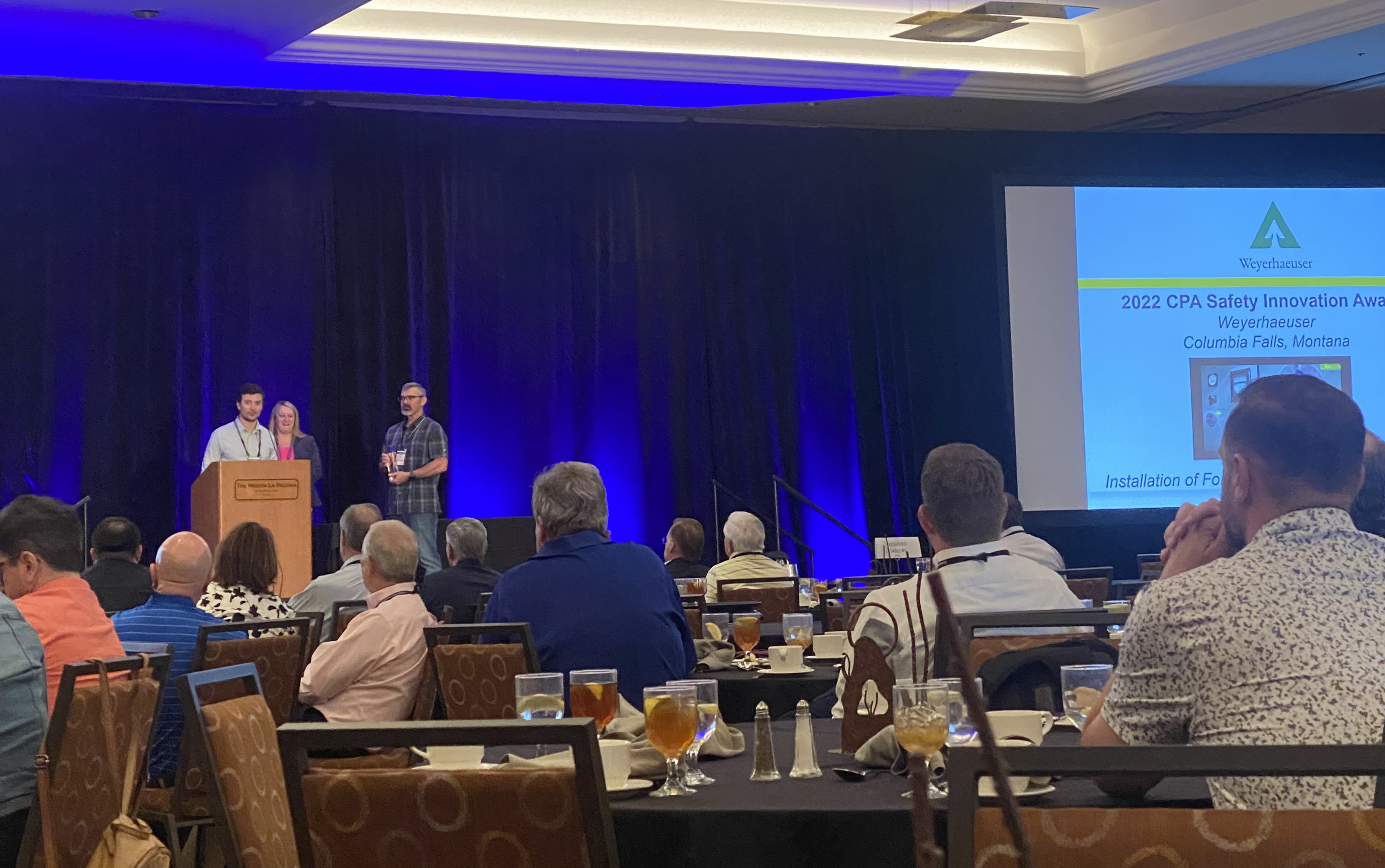 Image of Nick and Justin accepting the award at the CPA conference.