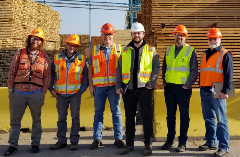 Image of Kalispell employees and partners wearign PPE.