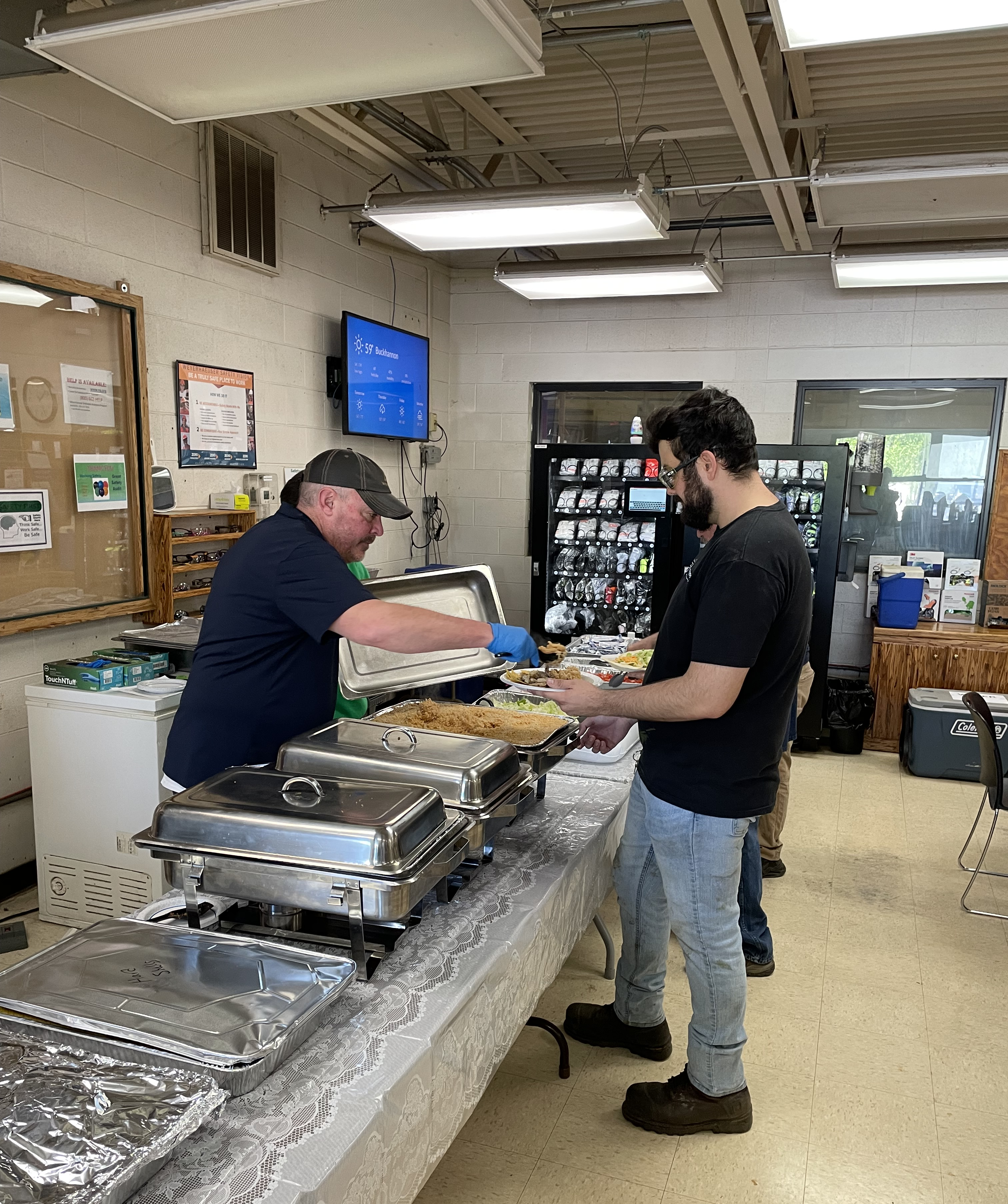 Image of employees celebrating one of Buckhannon's many safety milestones with a meal provided by the mill.