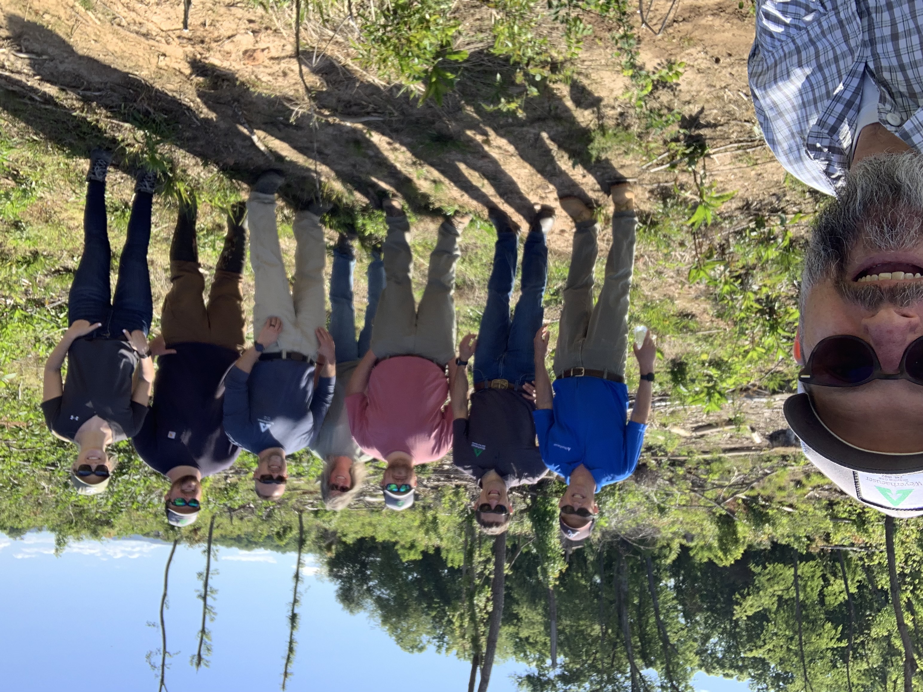 Image of Chad Leatherwood (far left), Rick Cozine, Jared Richardson, Evan Gobble, Amy Phillips, Jason Bowman, Caleb Parker and Andi Flores audit a supplier’s property near our OSB mill in Elkin, North Carolina.