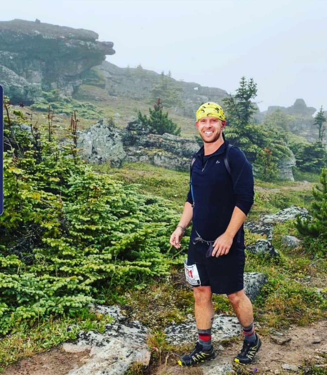 Image of Lonnie Naylor running in the Canadian Rockie Mountains.