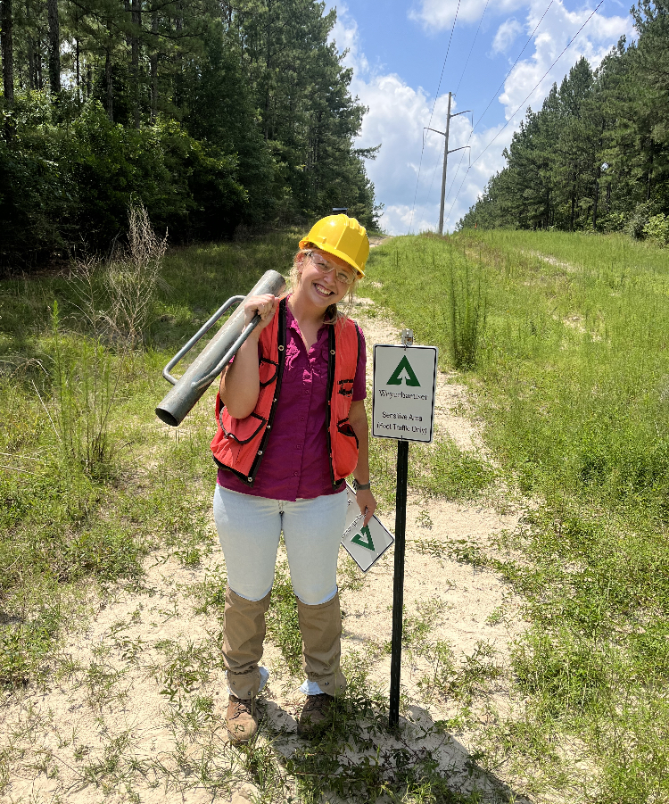 Image of Clari closing off a trafficked right-of-way wehn the team discovered gopher tortoises nearby.
