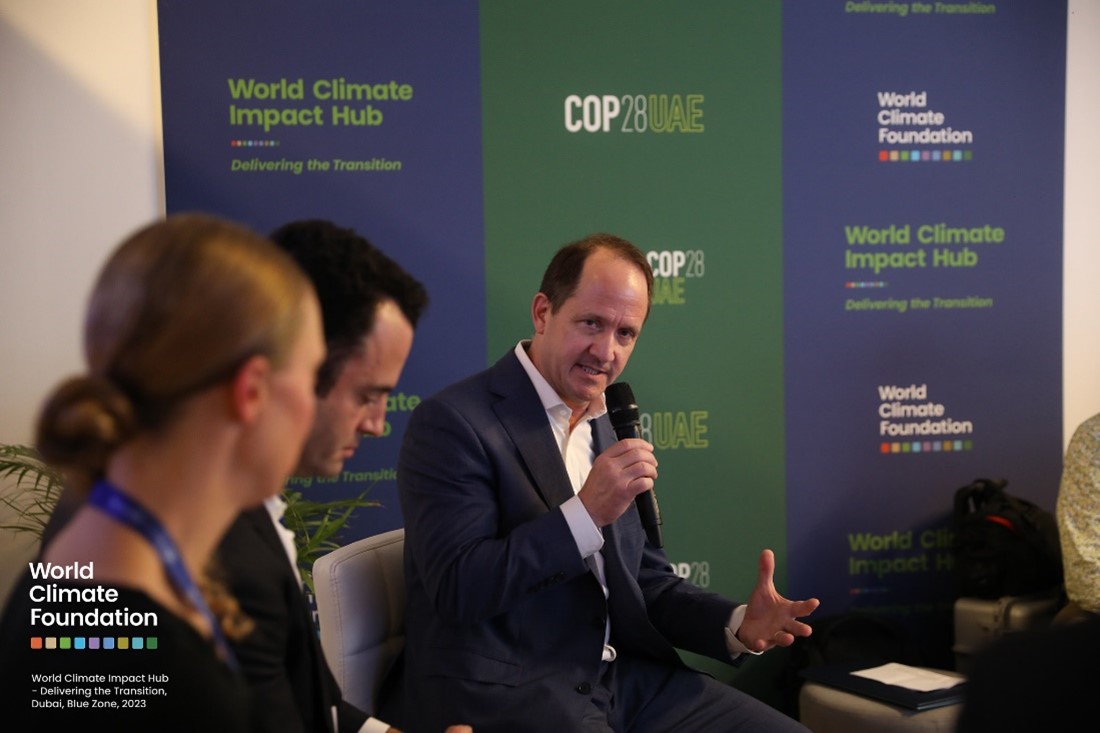 Image of Russel responding to a question during a panel discussion we co-hosted at COP28.