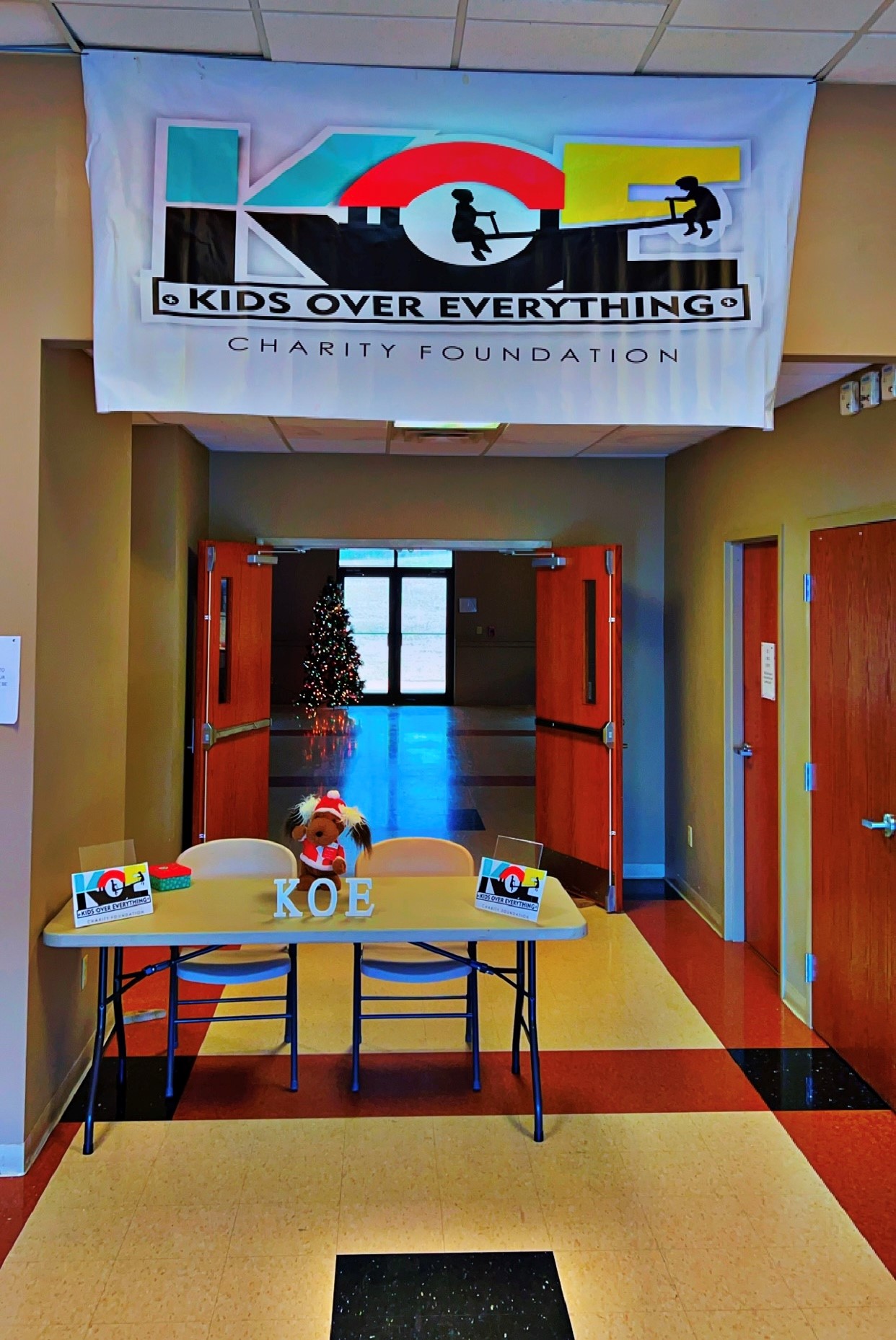 Image of a banner for the charity Jacob founded, Kids Over Everything.