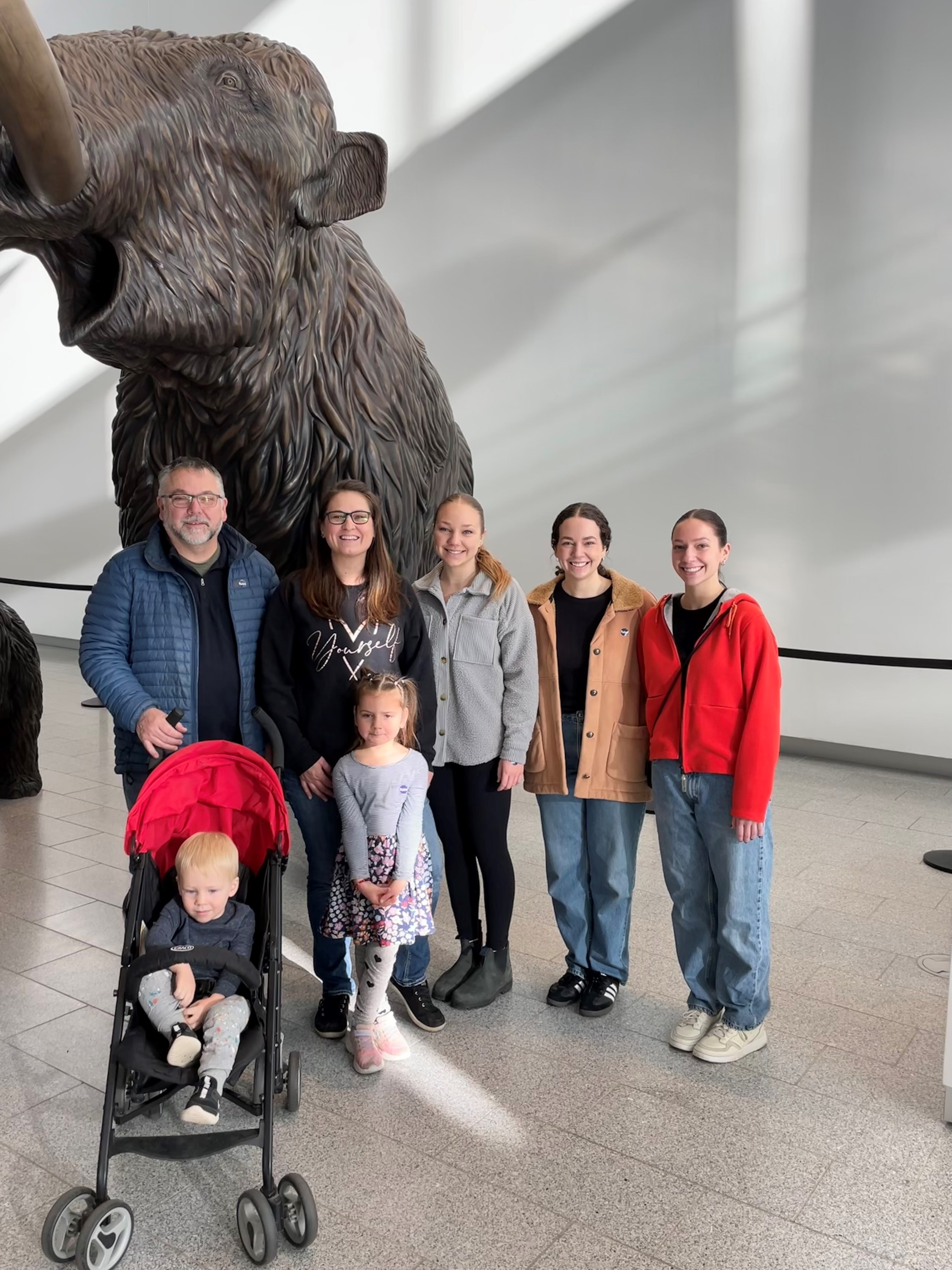 Image of Amanda and her family visiting the Royal Alberta Museum in Edmonton.