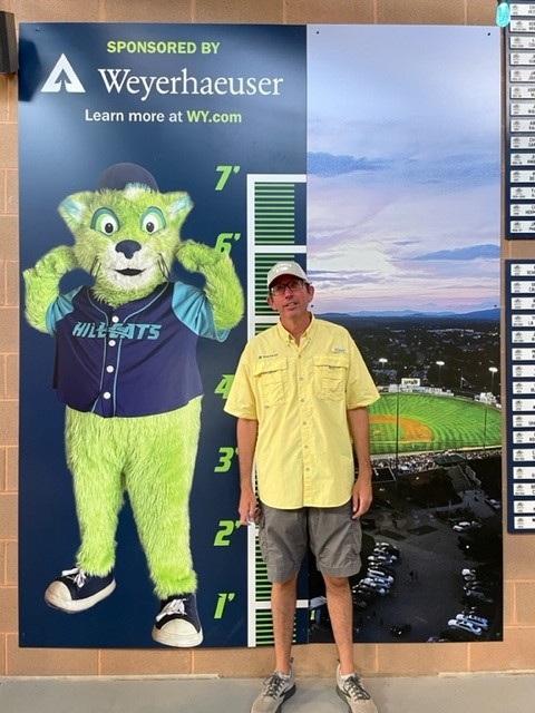 Ben Kobek, area manager for our Lynchburg Timberlands, measures up against the Hillcats growth chart.