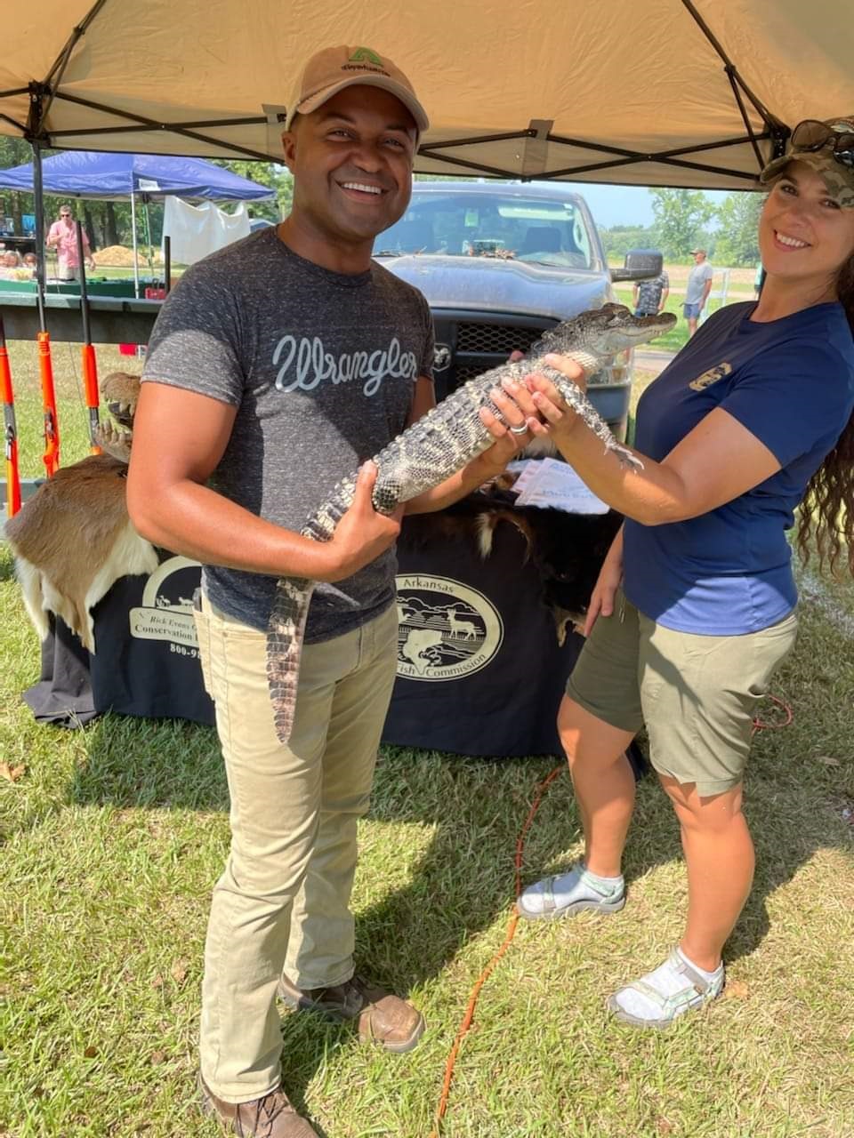 Shaun gets up close and personal with local wildlife while representing Weyerhaeuser at the Dierks Pine Tree Festival. The baby alligator was courtesy of the Arkansas Game and Fish booth!
