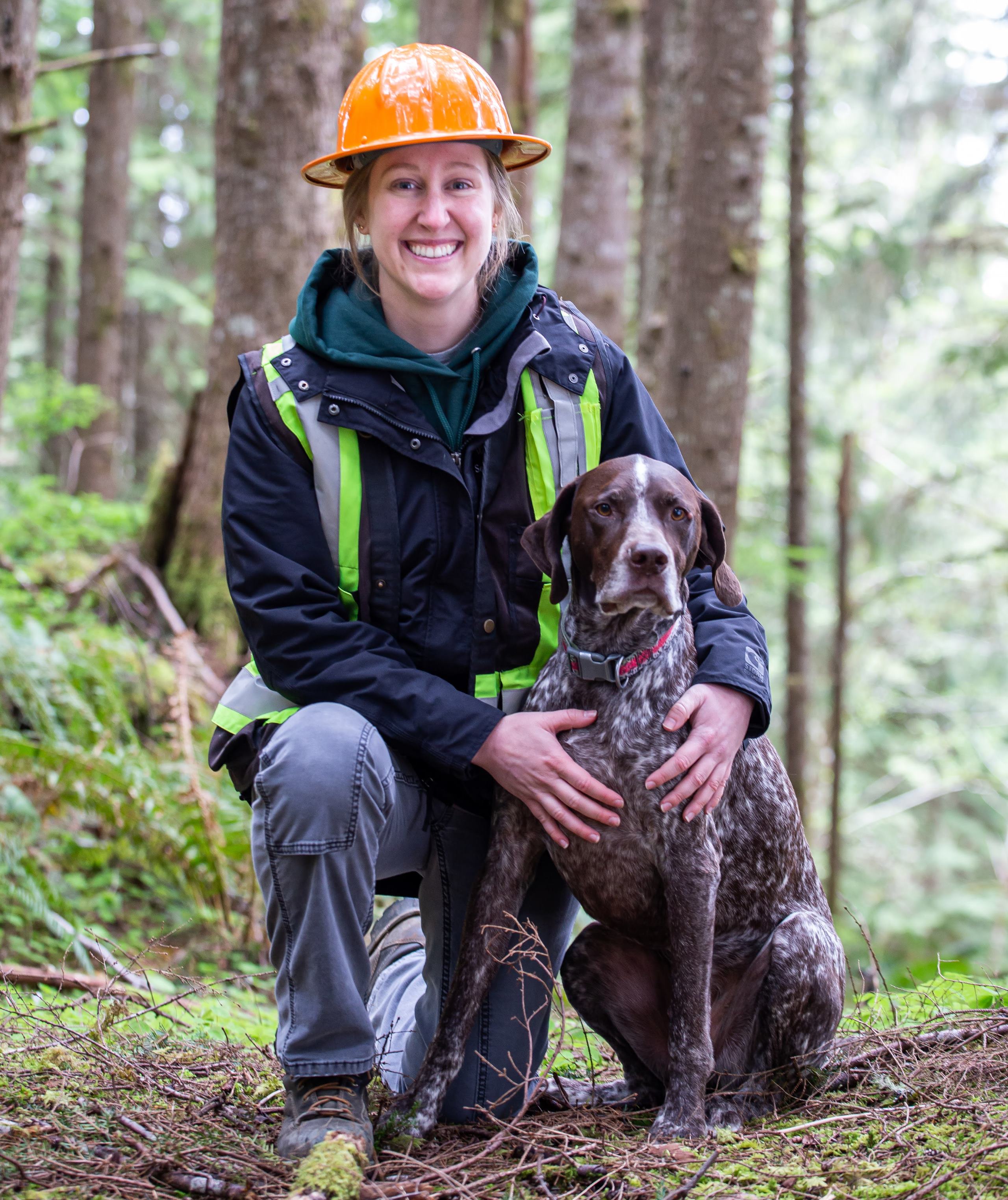 Anya Hall, Oregon seedling sales manager, with her dog Bradley.