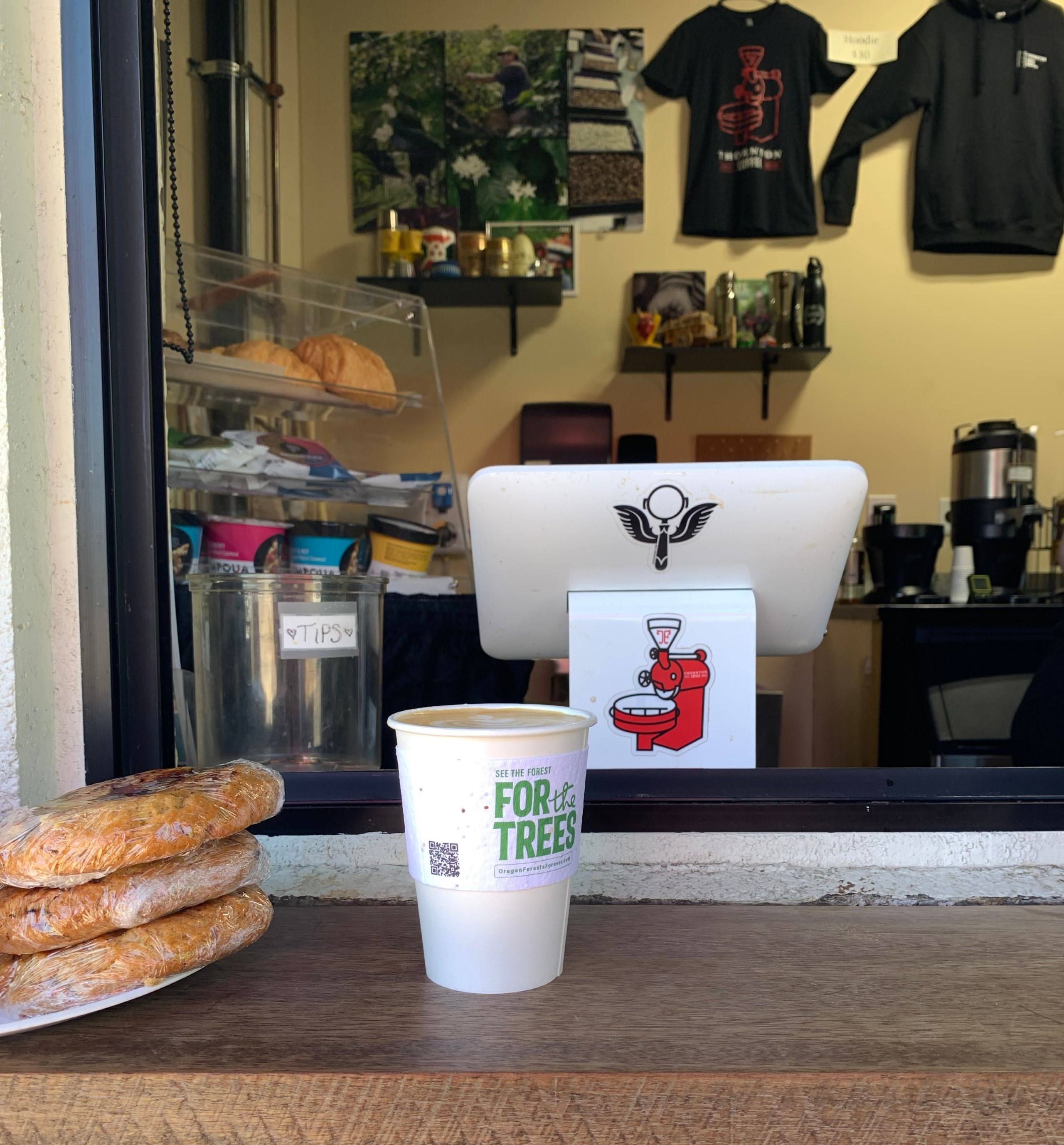 A For the Trees coffee sleeve distributed at Thornton Family Coffee Roasters in Beaverton, Oregon.