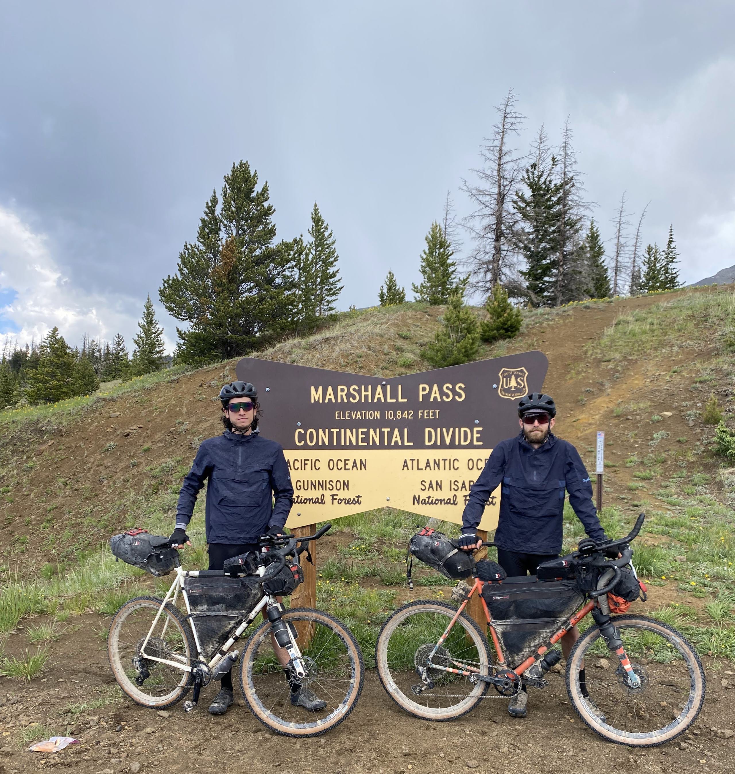 Patrick (right) and his friend Tyler Gatlin pause at Marshall Pass while participating in the Tour Divide race. All the gear and provisions for their 25-day trek are strapped onto their bikes.