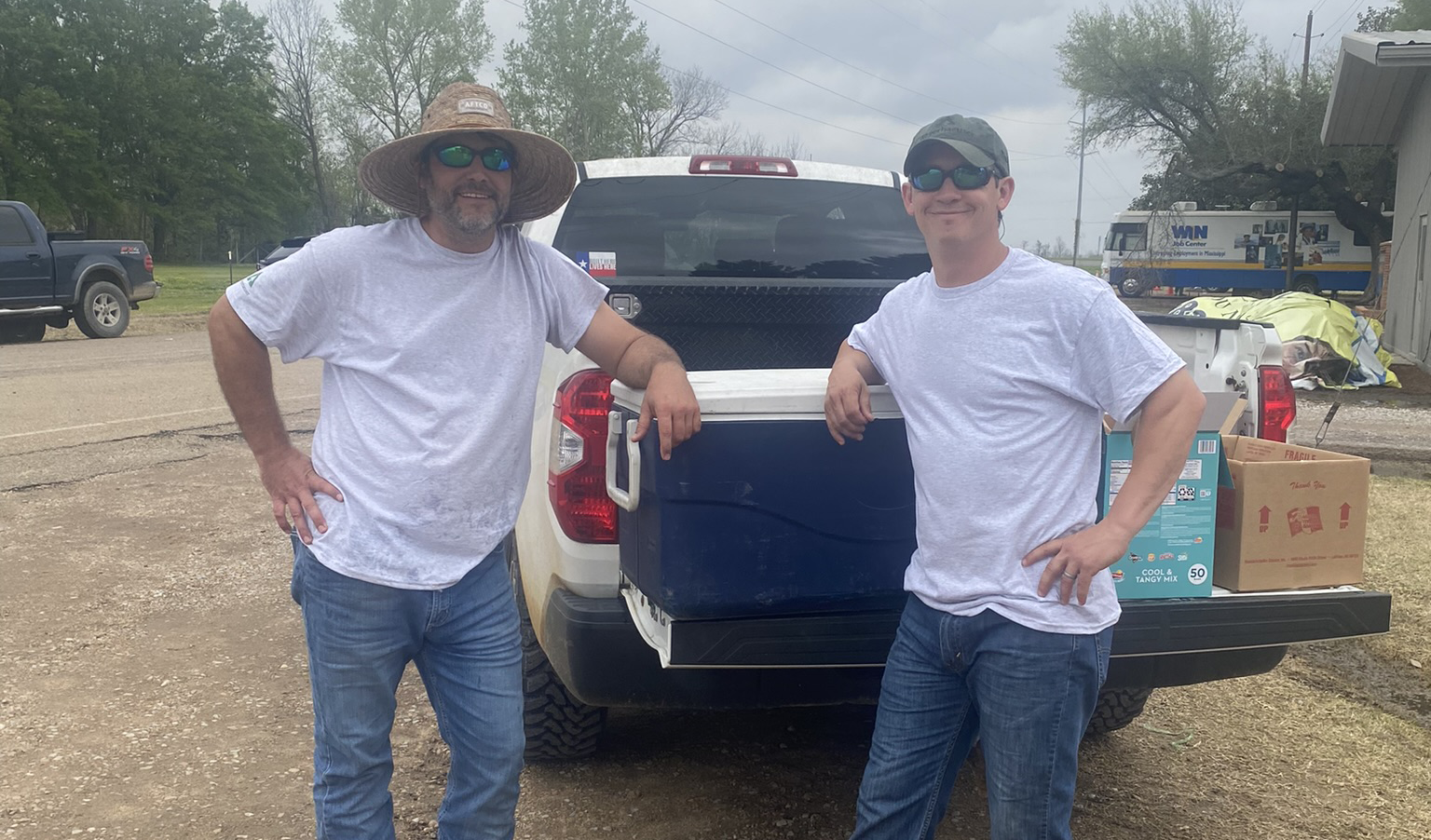 Image of Brett McCool and Dan Perry from our Brookhaven office bringing supplies to Rolling Fork.