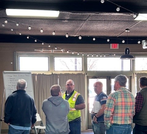 Image of the Bruce leadership team during an offsite training meeting.