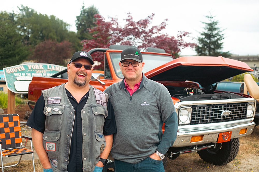 Men pose together during the Willapa Harbor Festival.