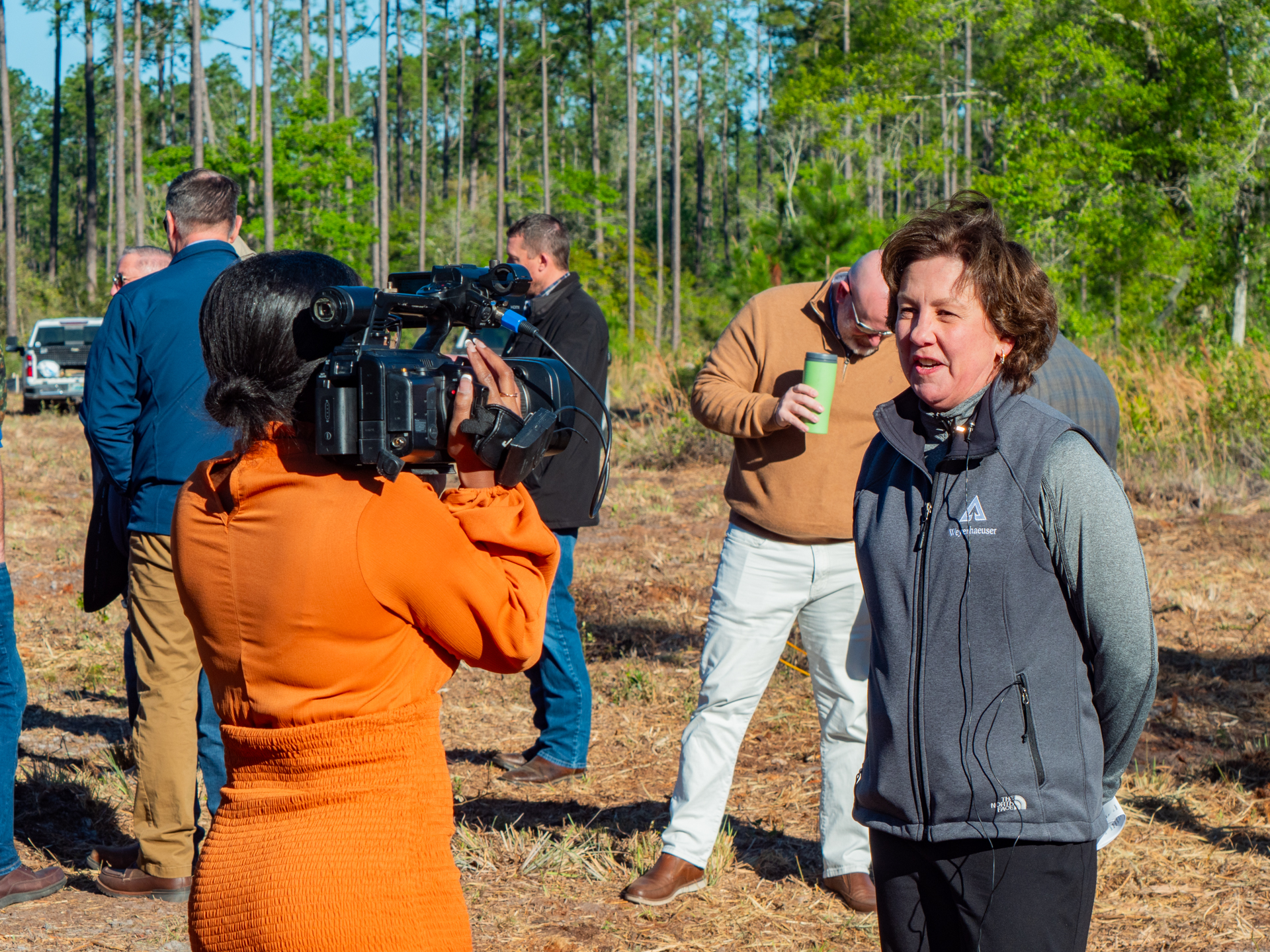 Image of Rose Fagler from the Weyerhaeuser Real Estate Development team addressing the media during the groundbreaking.