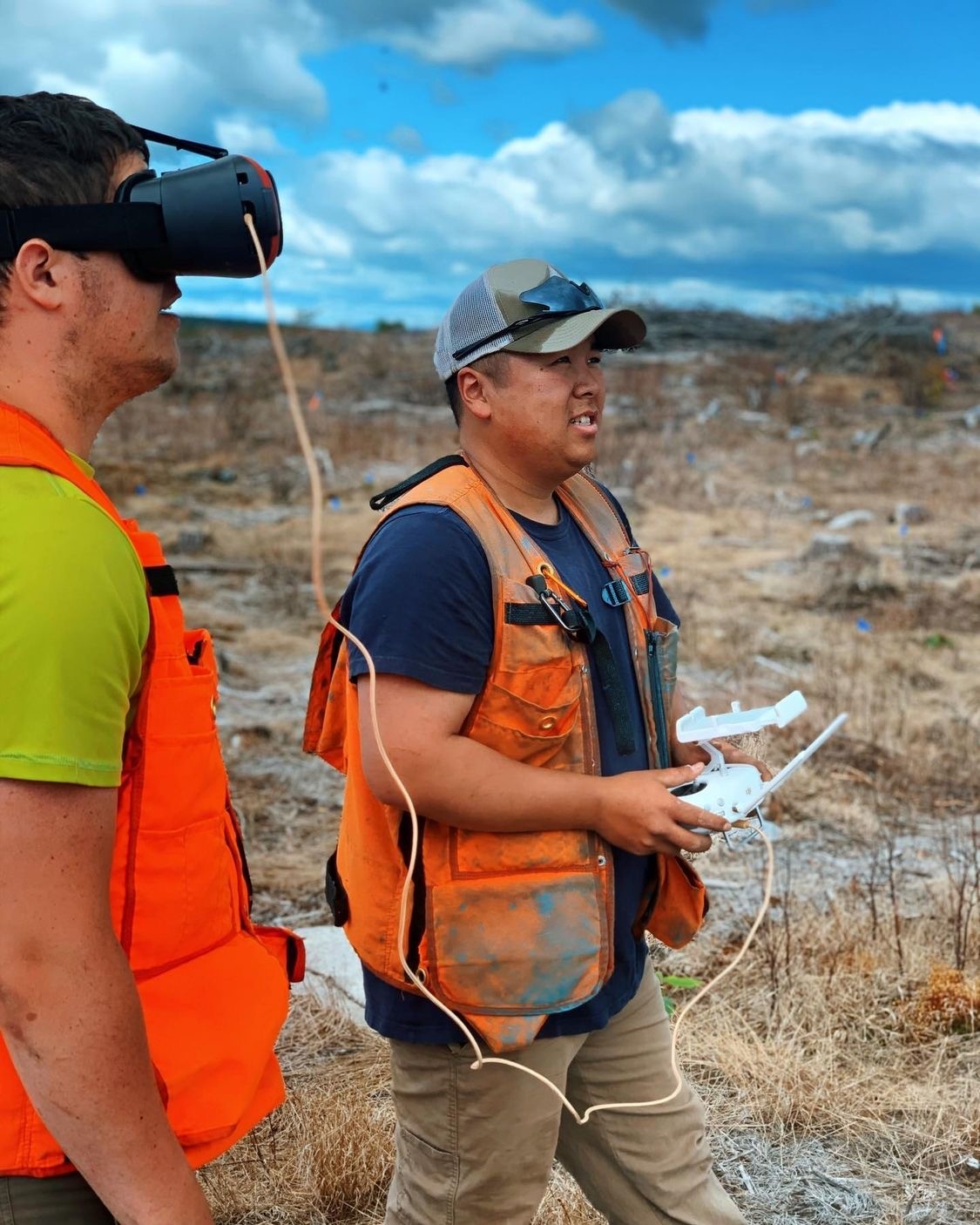 Image of Cullen demonstrating drone capabilities for a summer intern.