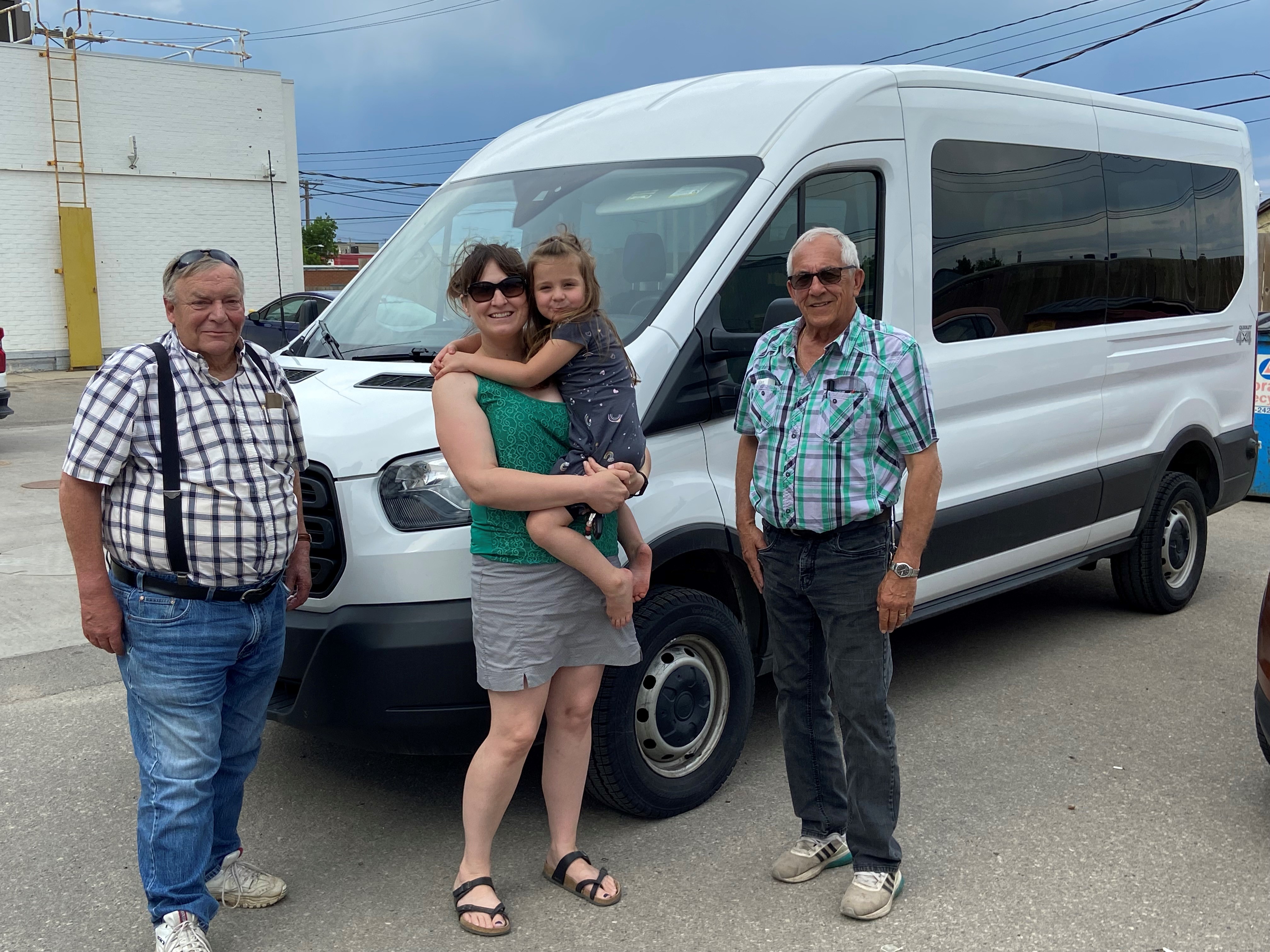 Image of Amanda picking up a 12-passenger van purchased for the Hudson Bay Early Learning Centre.