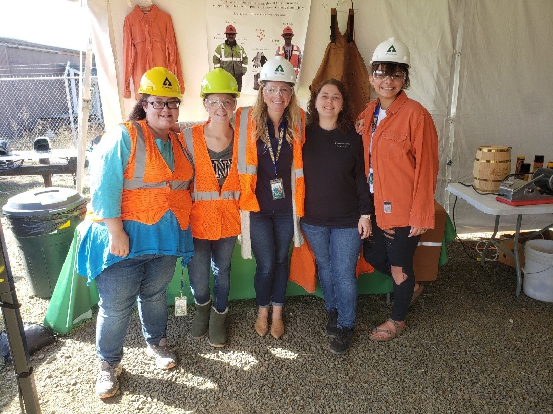 Image of Shaunna, second from right, who createad an educational PPE display for the Classroom to Career Expo.