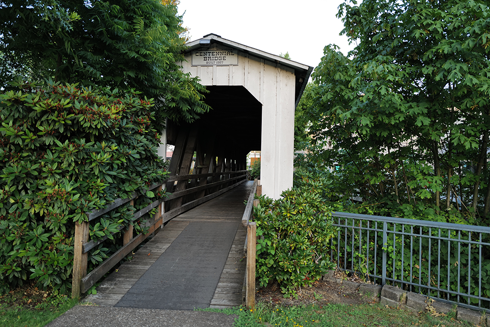 Image of a covered bridge, "Centennial Bridge," which was built in 1987 in Cottage Grove.