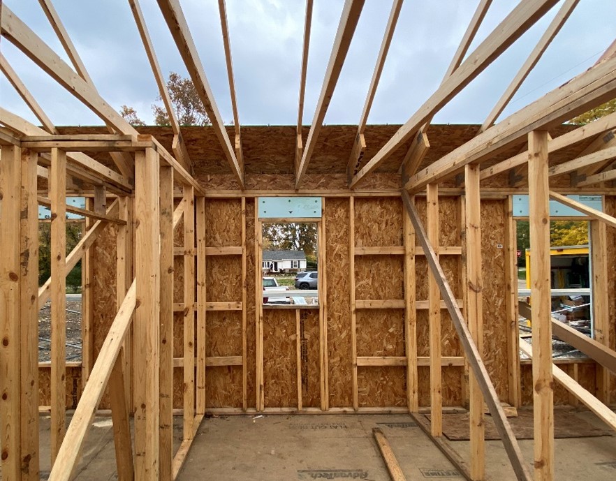Image of the interior of a framed house using the 'advanced framing technique.'