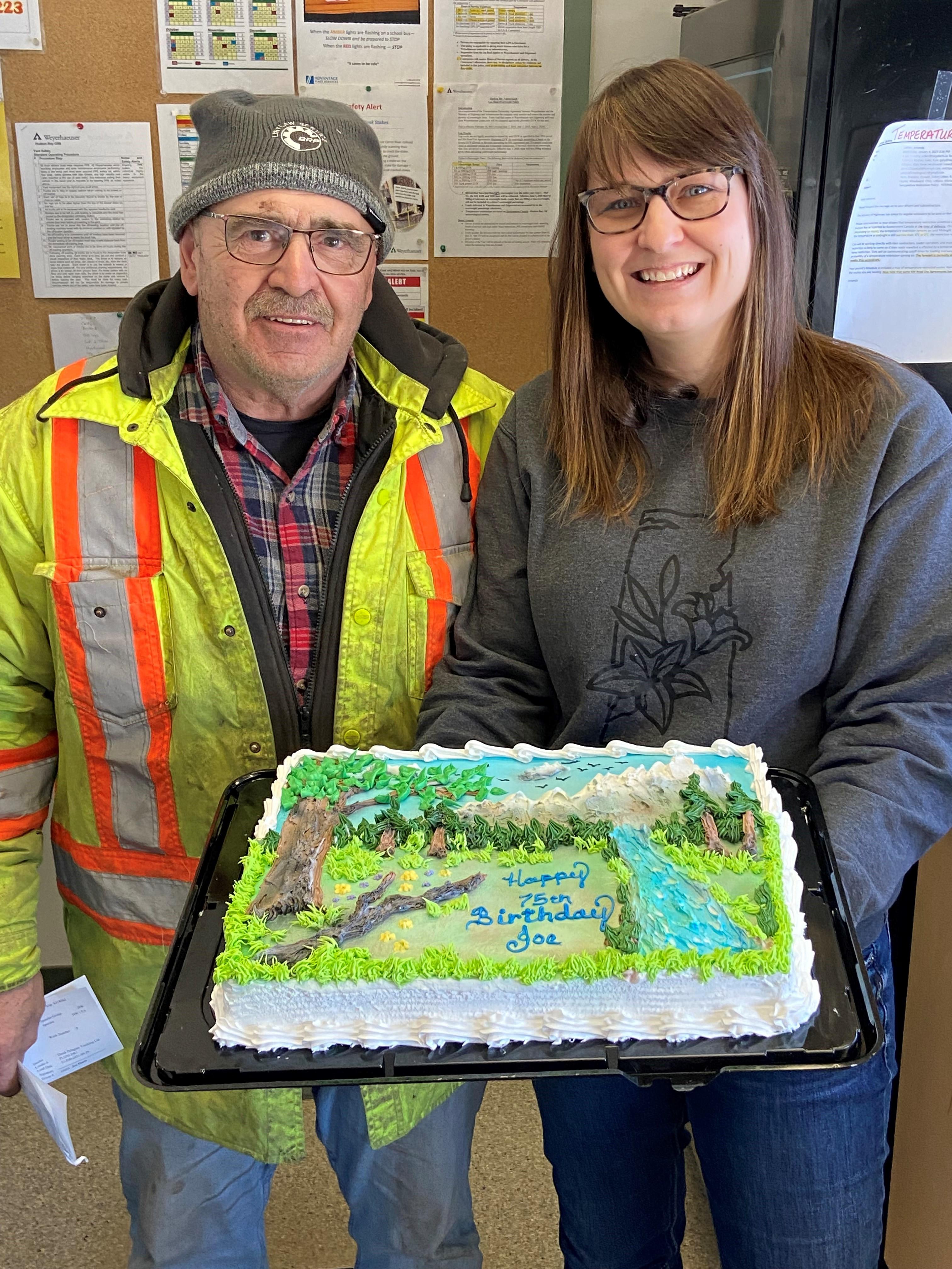 Image of Amanda helping to celebrate truck driver Joe Hartl's 75th birthday.