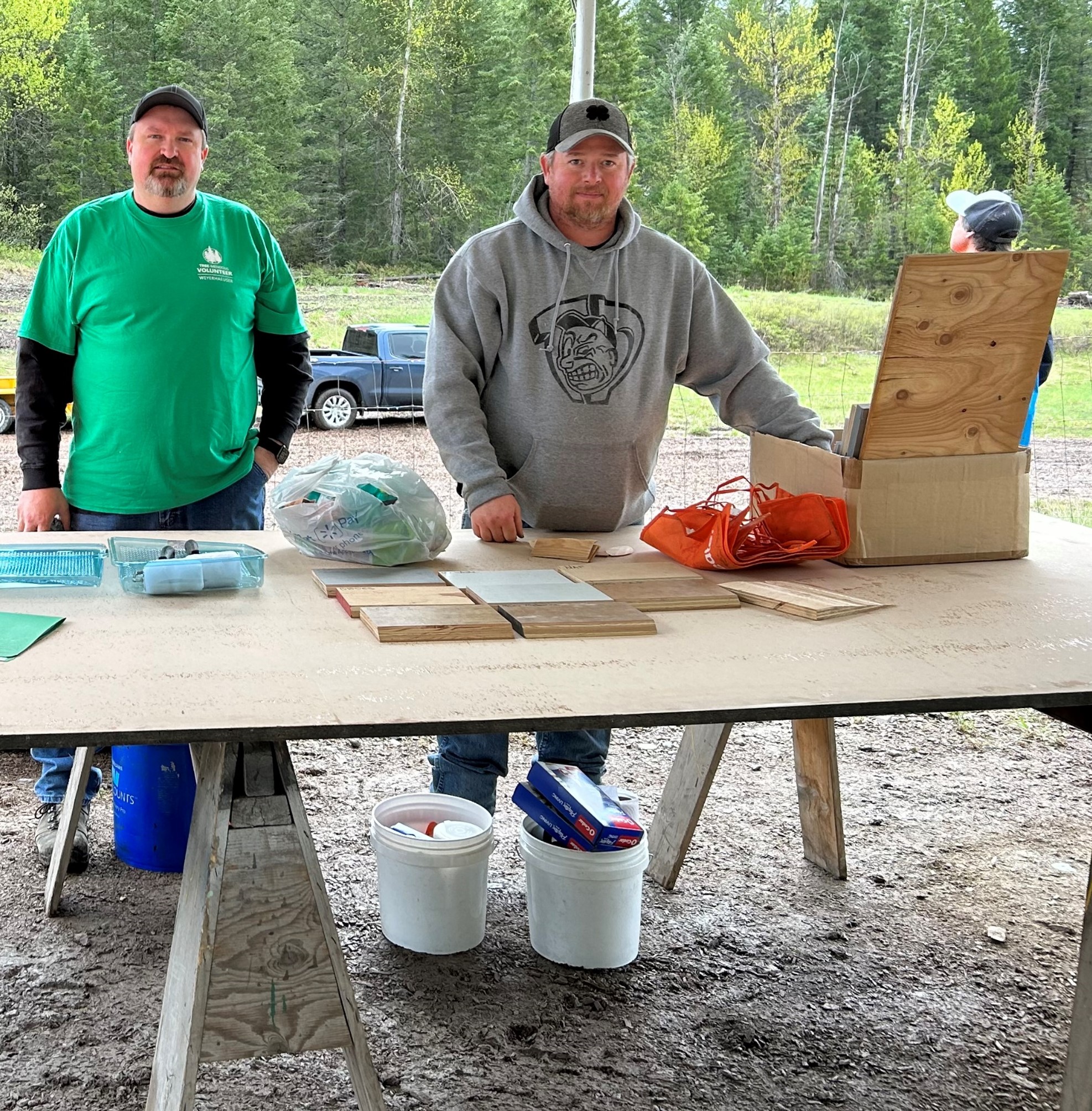 Image of Jeremy Strey and Tim Olson presenting our plywood learning station this year.