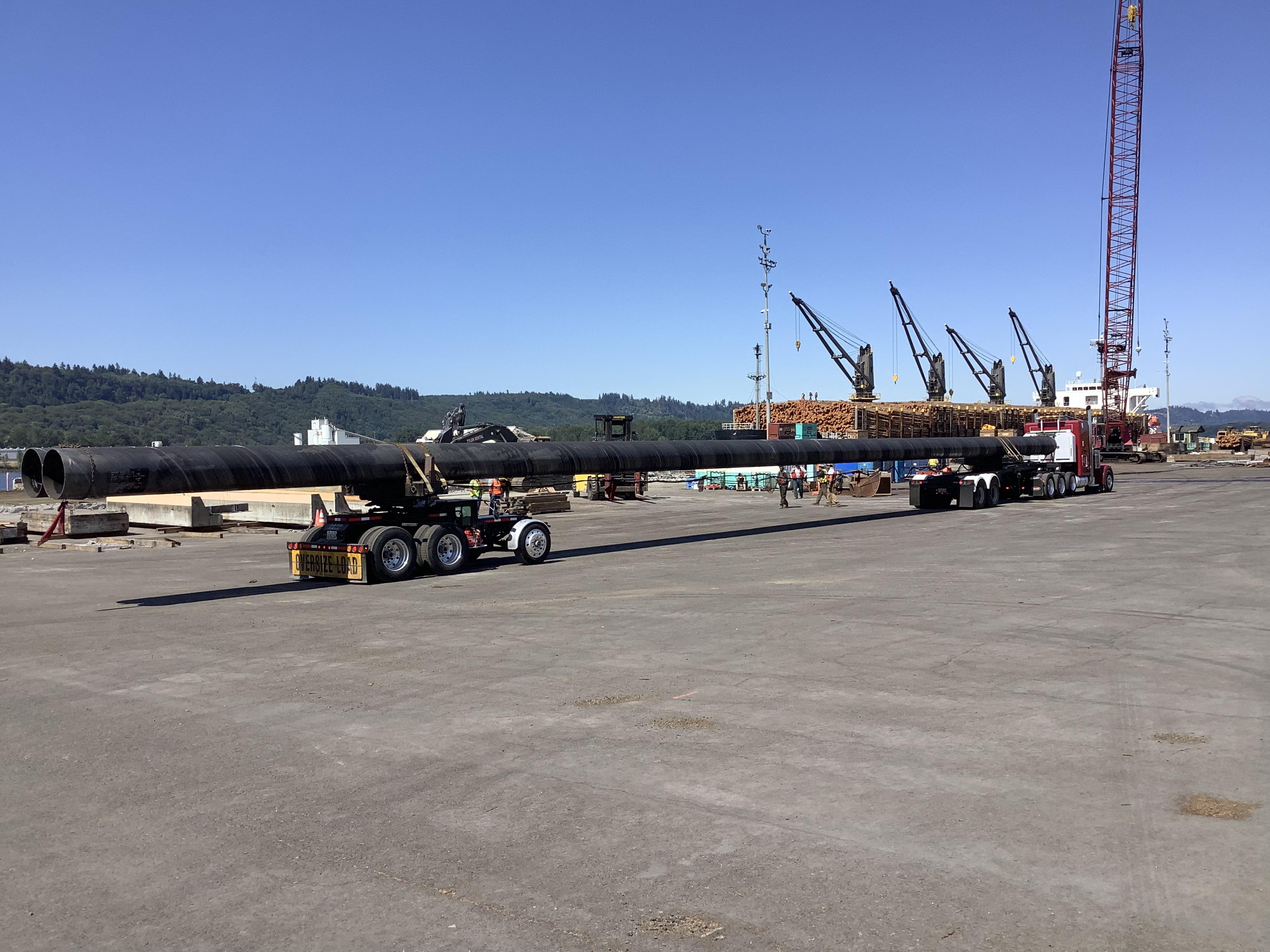 Image of a steel pier being delivered to the export yard.