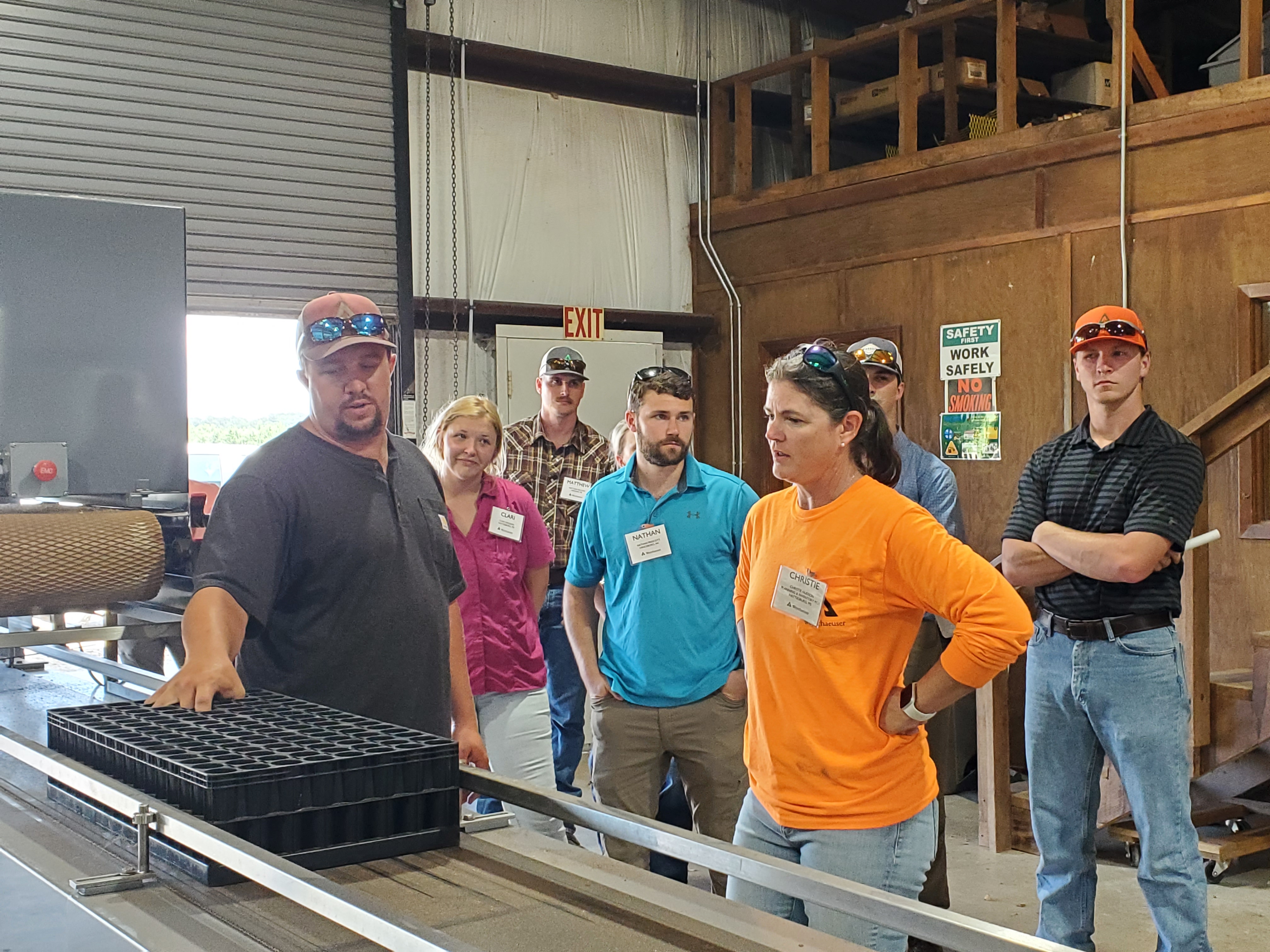 Image of interns taking part in a summer event during a tour at our Pearl River container nursery in Mississippi.