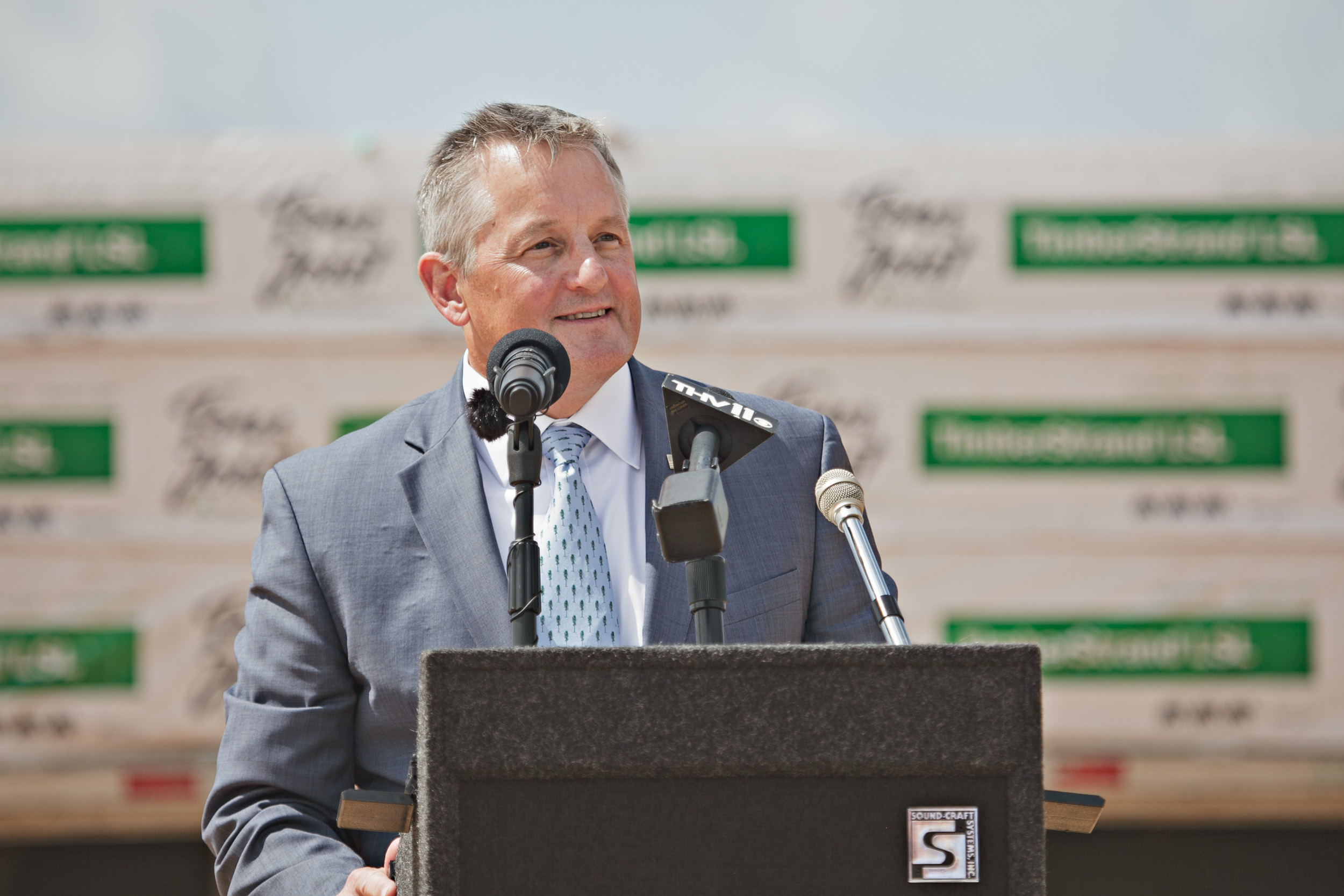 Image of a state official speaking at the groundbreaking ceremony.
