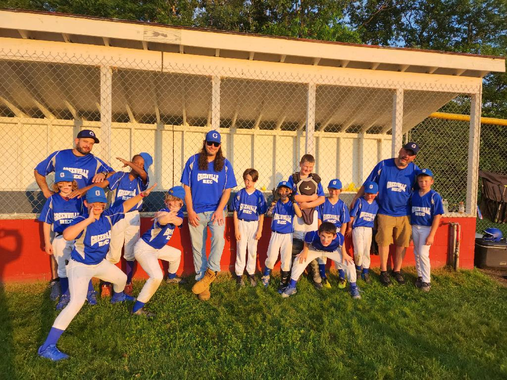 Image of Drew with the Greenville Rec baseball team he helped coach last year.