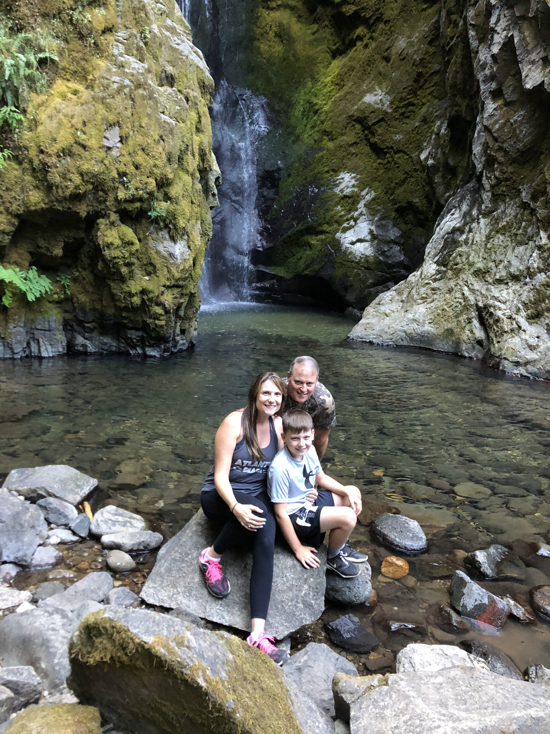 Image of Zack Allen with his wife and youngest son while hiking the Cascades.