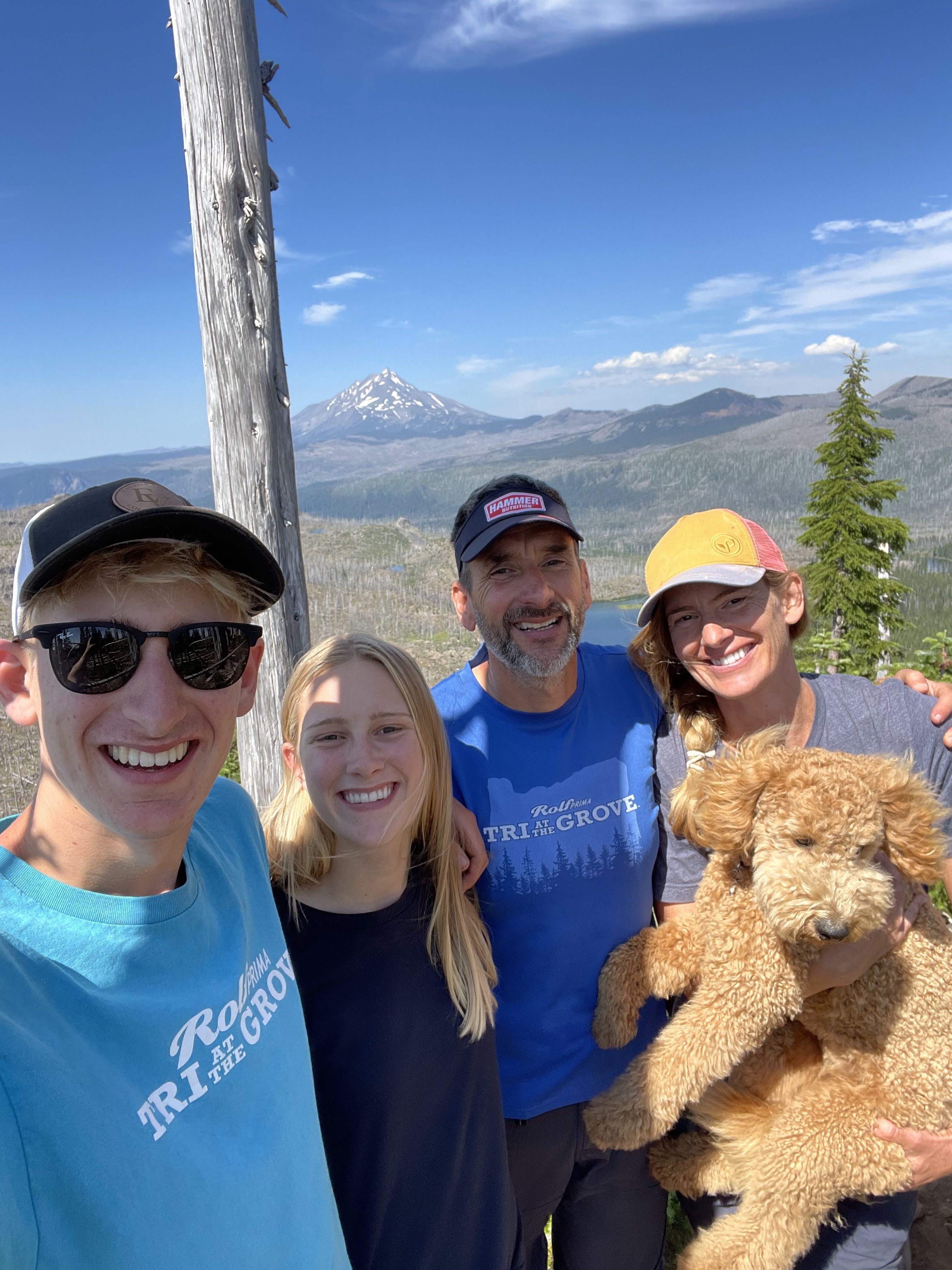 Image of Brad with his family on a trip to Mt. Jefferson with the family dog, Molly.