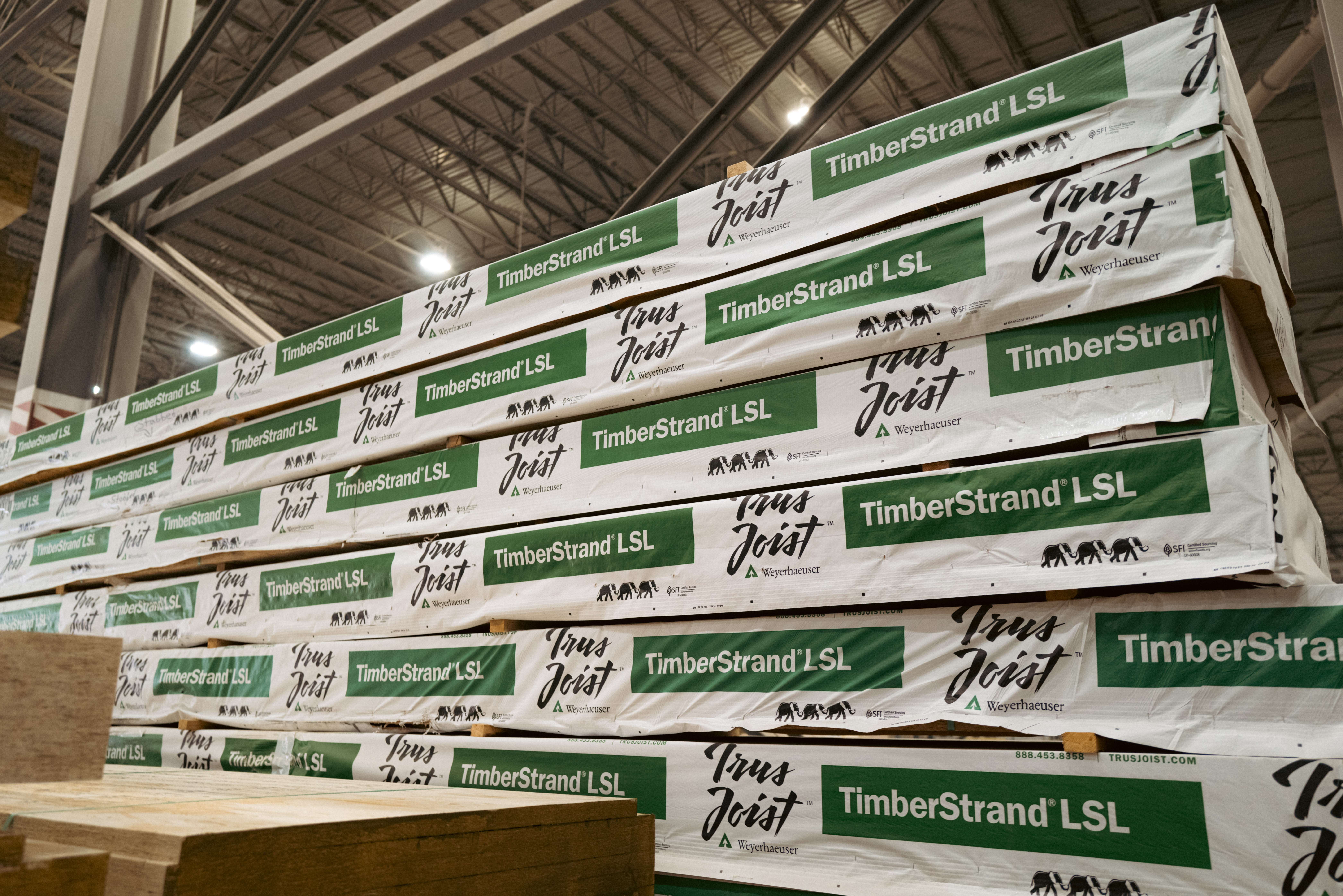 Image of TimberStrand LSL boarding stacked in the Kenora facility.