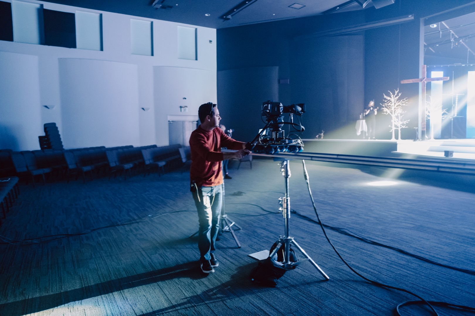 Image of Josh filming an event for his church.