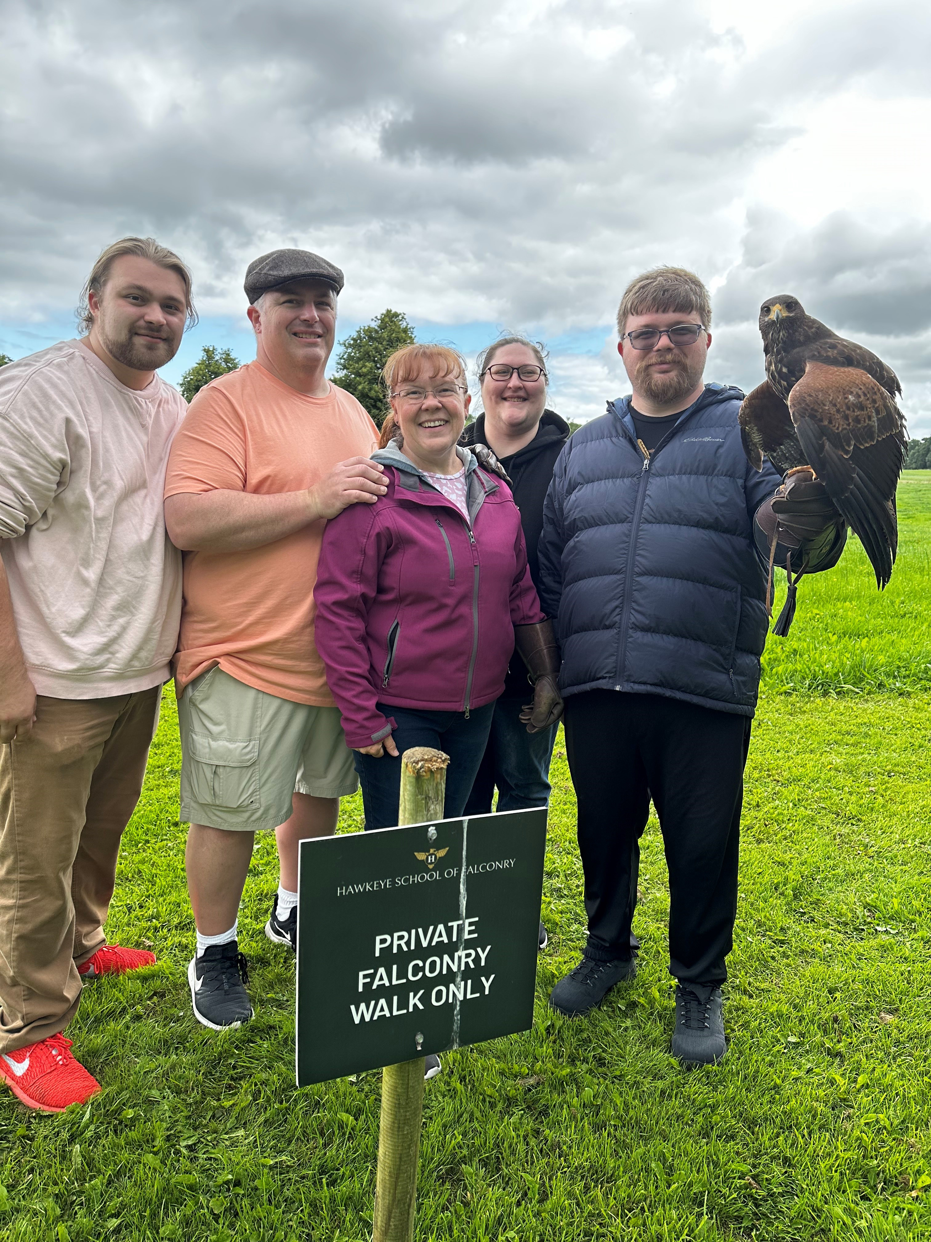 Image of Dionna and her family at a falconry school while on vacation in Ireland.