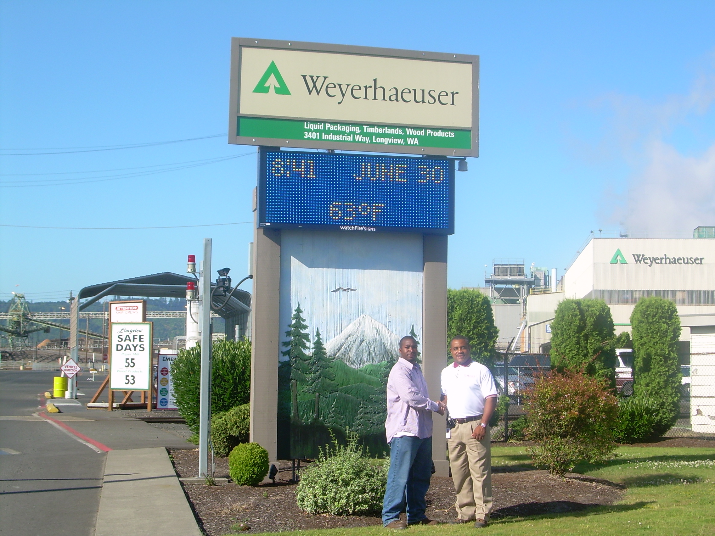 Image of Travis and colleague Terry Alexander not long after Travis started with the company.