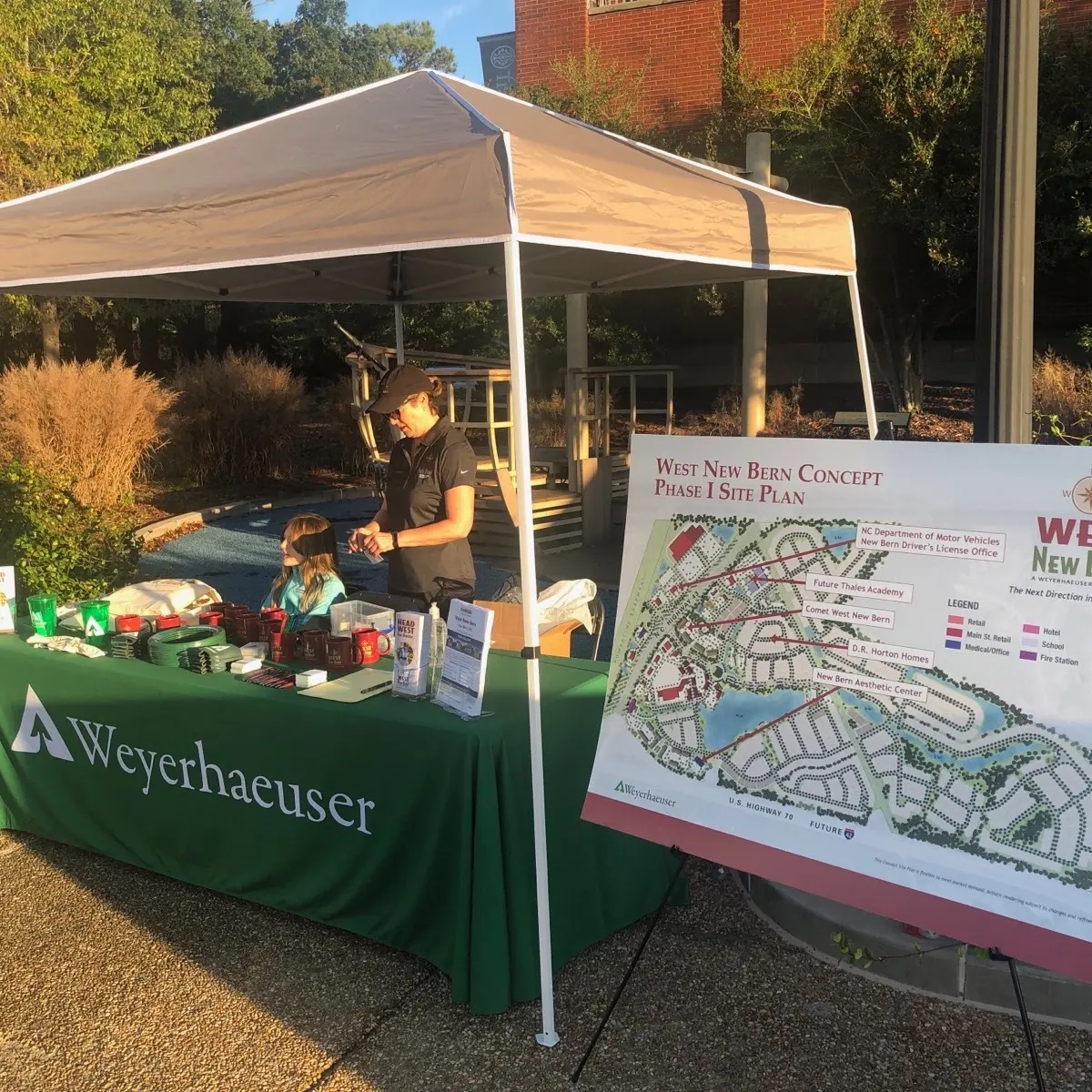 Image of the Weyerhaeuser booth at the race, which provided runners, their friends and family, and local residents with tchtchkes and info about Weyerhaeuser.